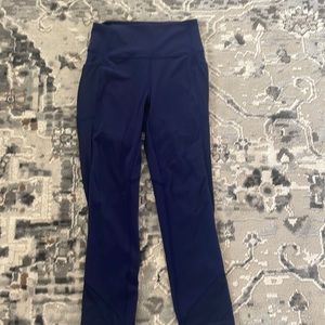 Navy blue Lululemon leggings with mesh pockets